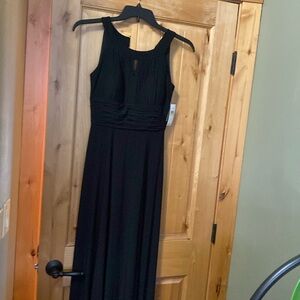 Floor length black formal dress.
SLNY brand.
